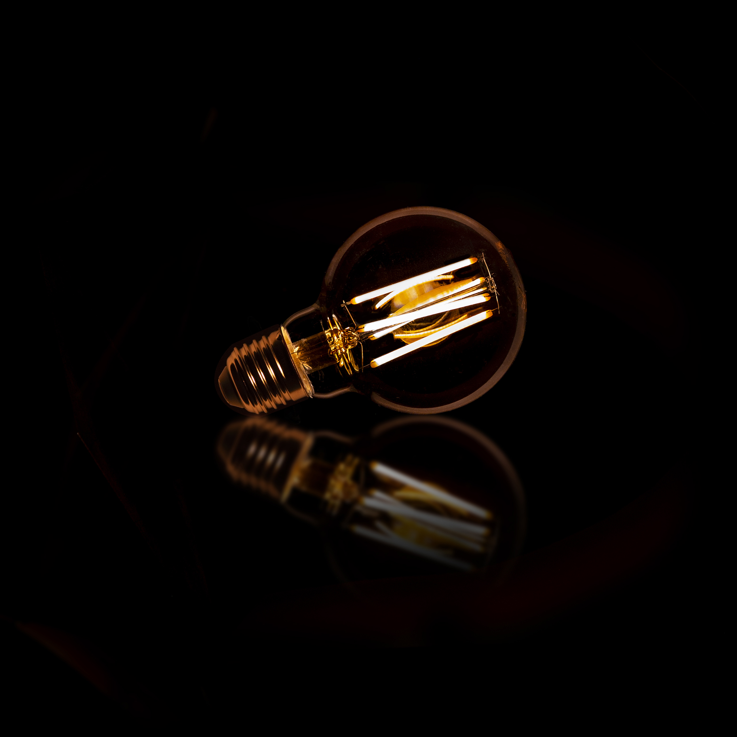 Ljuskälla LED [G70] filamentkula Ø7 / Bärnstensfärgat glas